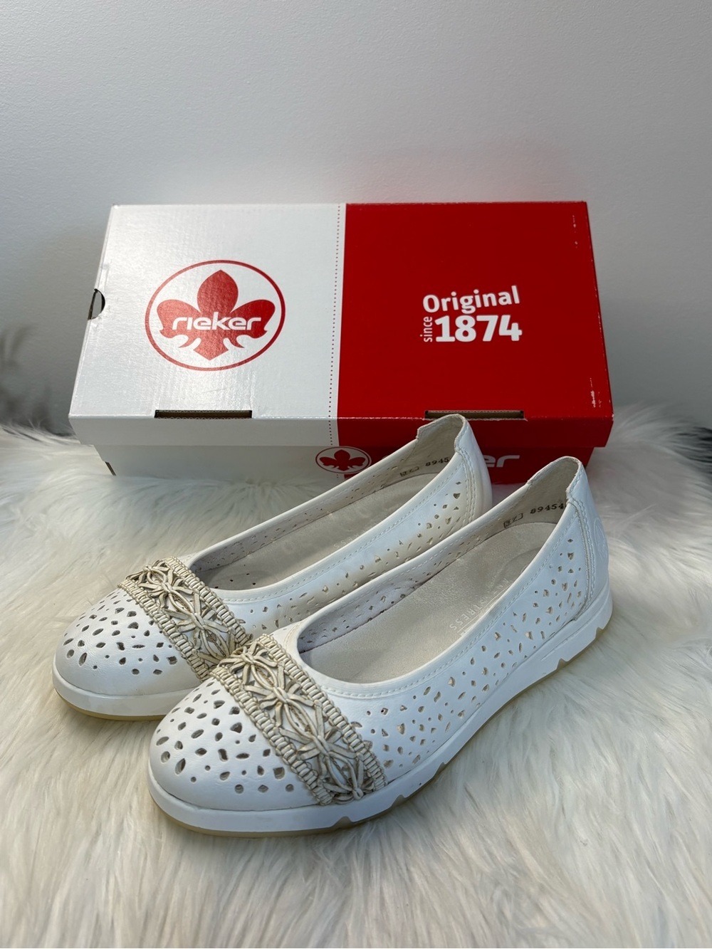 (53)Rieker White Perforated Flats with Braided Accent